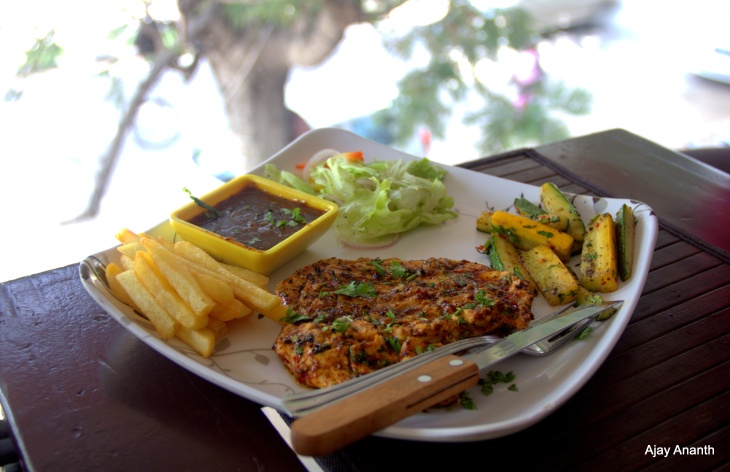 Chicken Steak with Pepper Sauce, Veggies and Fries at Smallys Bangalore